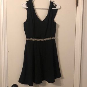 Black skater dress with embellishment
